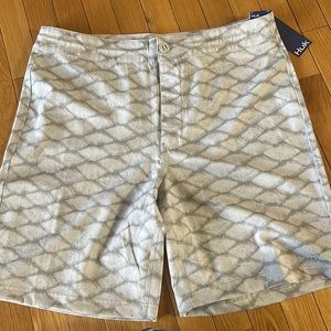 Huk swim shorts. Brand new with tags. Size 36
